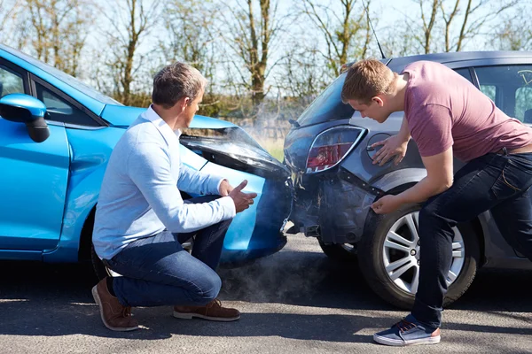 depositphotos_36839649-stock-photo-drivers-inspecting-damage